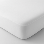 White mattress cover on a plain background